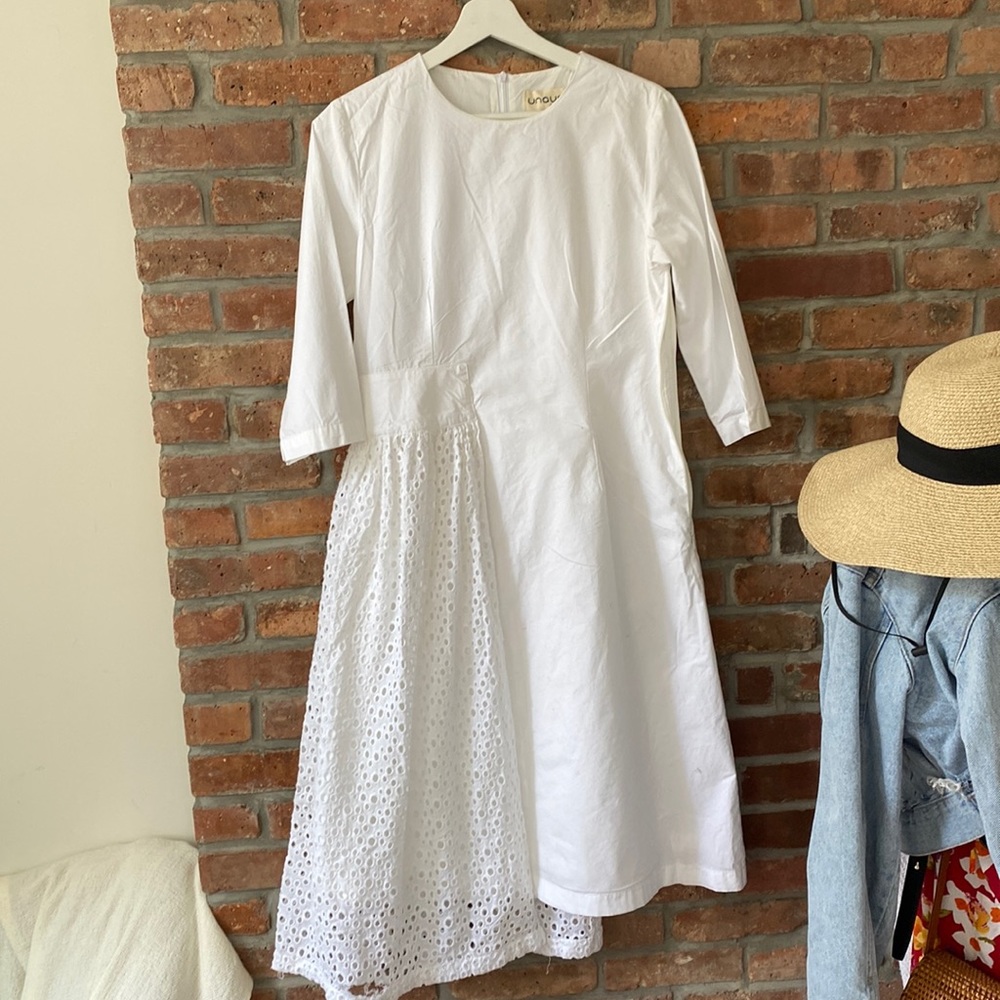Cotton, not seen through white dress. Super comfortable. Modest. Asymmetrical.